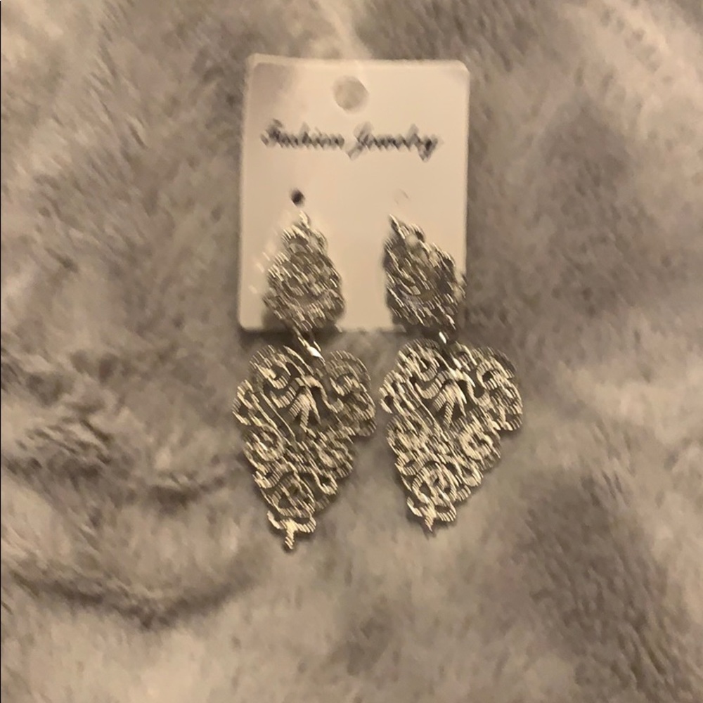 Silver tone dangle earrings